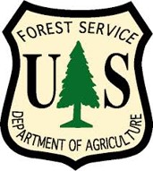 The forest service department of agriculture logo.